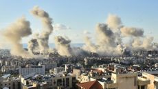 Smoke billows above Beirut's southern suburbs following an Israeli airstrike just one day before a ceasefire was announced