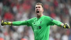 Liverpool goalkeeper Adrian celebrates after winning the Uefa Super Cup