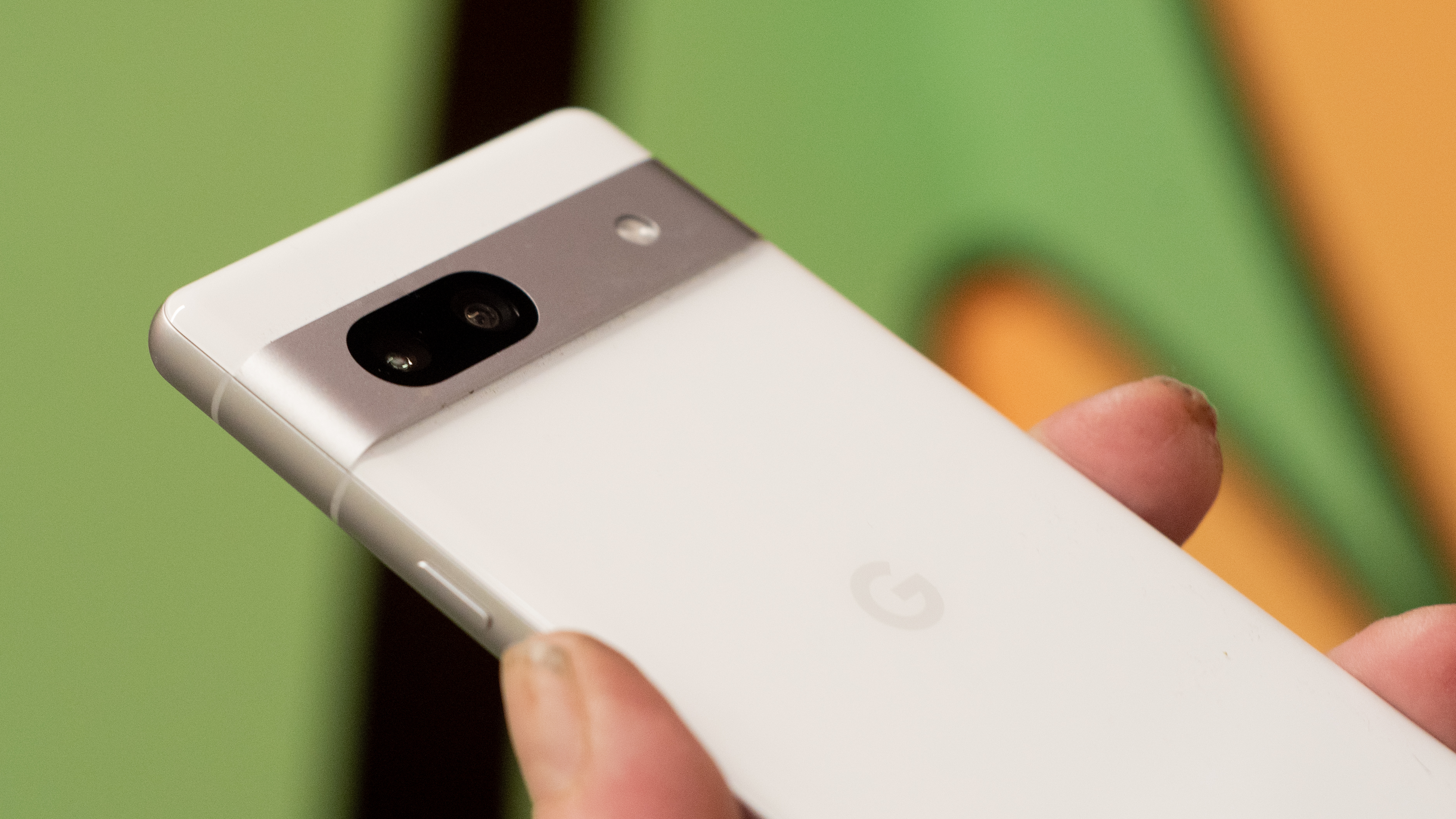 Google Pixel 7a phone showing screens camera and Android 13