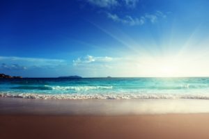 beautiful seascape and sun on turquoise sea and sky