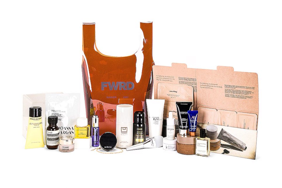 A group of small bottles and packages in a beauty bag