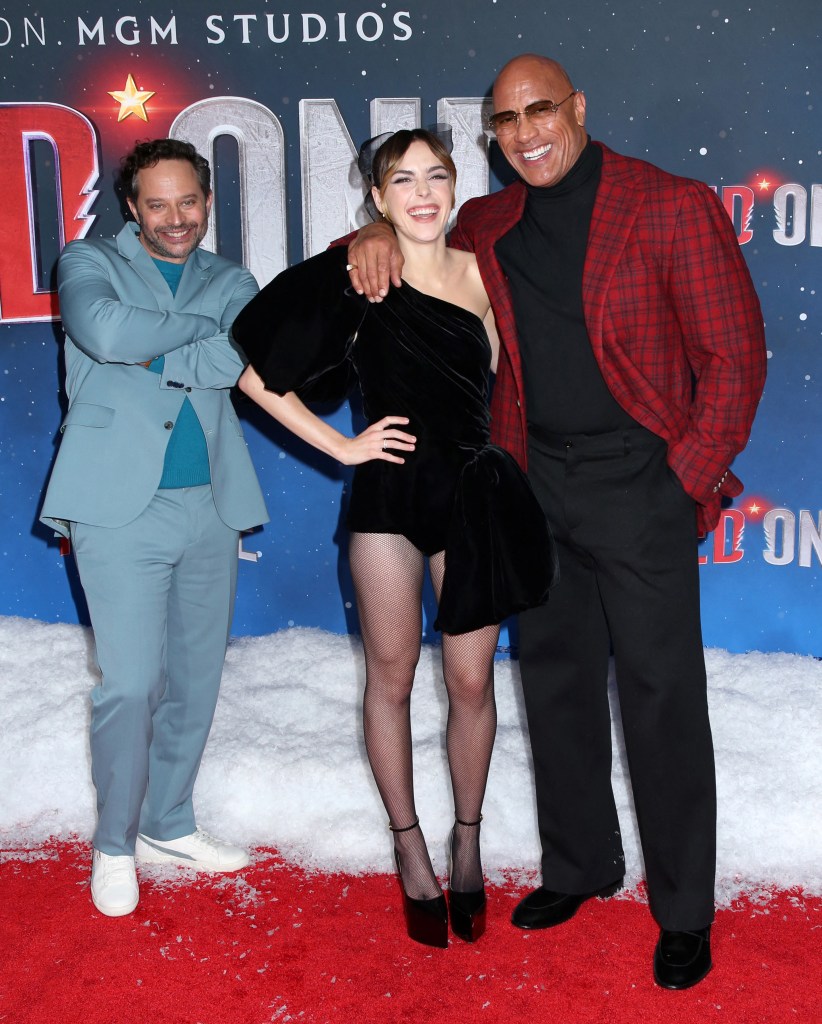 Nick Kroll, Kiernan Shipka and Dwayne Johnson posing at the 'Red One' New York Premiere by Amazon MGM Studios, Alice Tully Hall on November 11, 2024