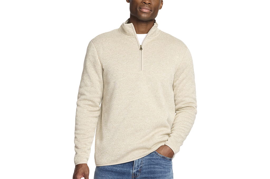 Robbie Jones wearing a half-zip sweater