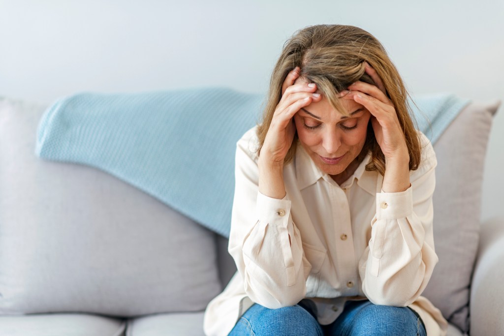 A woman suffering from a headache