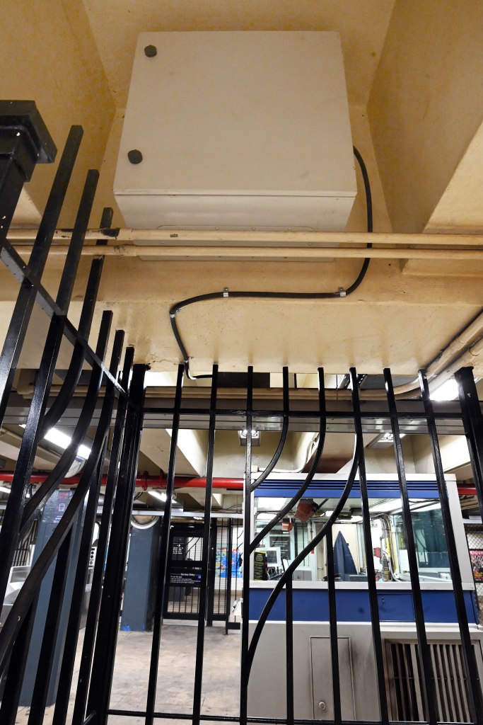 Scent diffuser machine in the Grand Ave.-Newtown subway station, Queens, New York, emitting pleasant aroma to mask odor