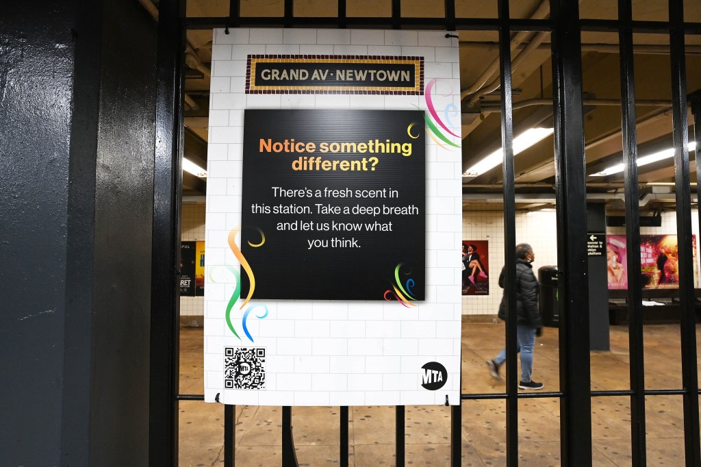 Signage for new scent diffuser in the Grand Ave-Newtown subway station, Queens, New York