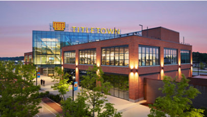 TitletownTech building surrounded by trees from a panoramic view at a sunset.