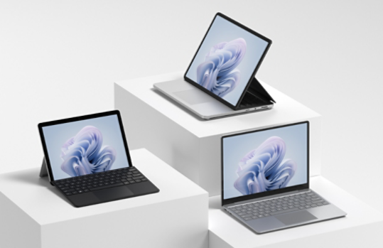 Three Surface devices are observed on plinths of various heights