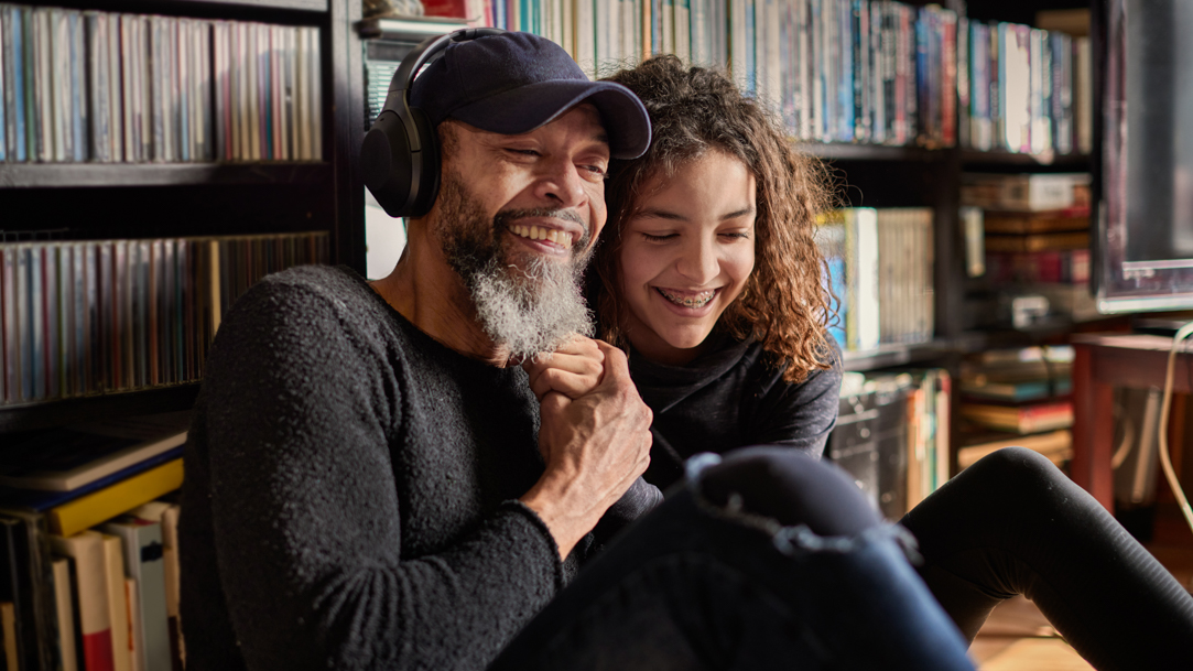 Father and daughter laugh together