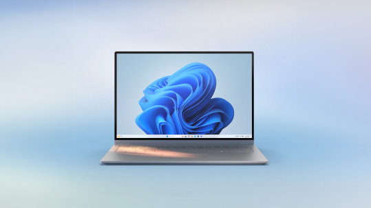 An open Microsoft Windows laptop with the blue bloom screen