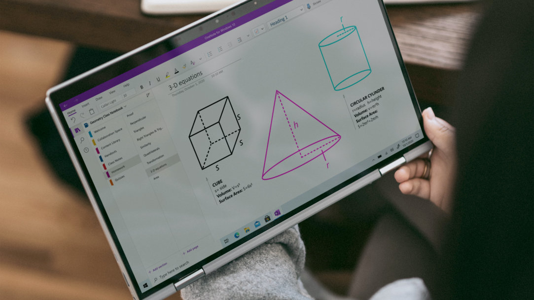 Person holding tablet with math diagrams on screen