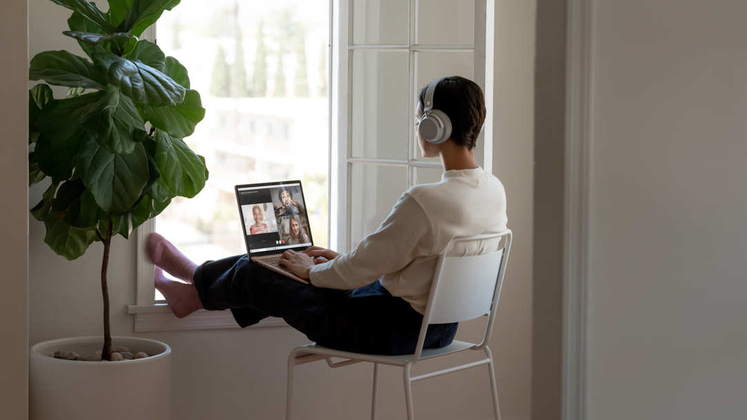 Person in a video conference using a Surface device