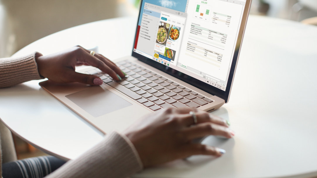 Person using Microsoft Surface device as they do some online shopping