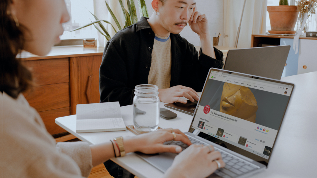 Woman using Microsoft Edge on Surface laptop