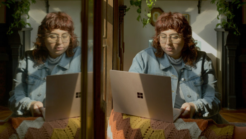 Woman works on Surface laptop