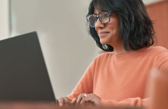 A woman working with her laptop.