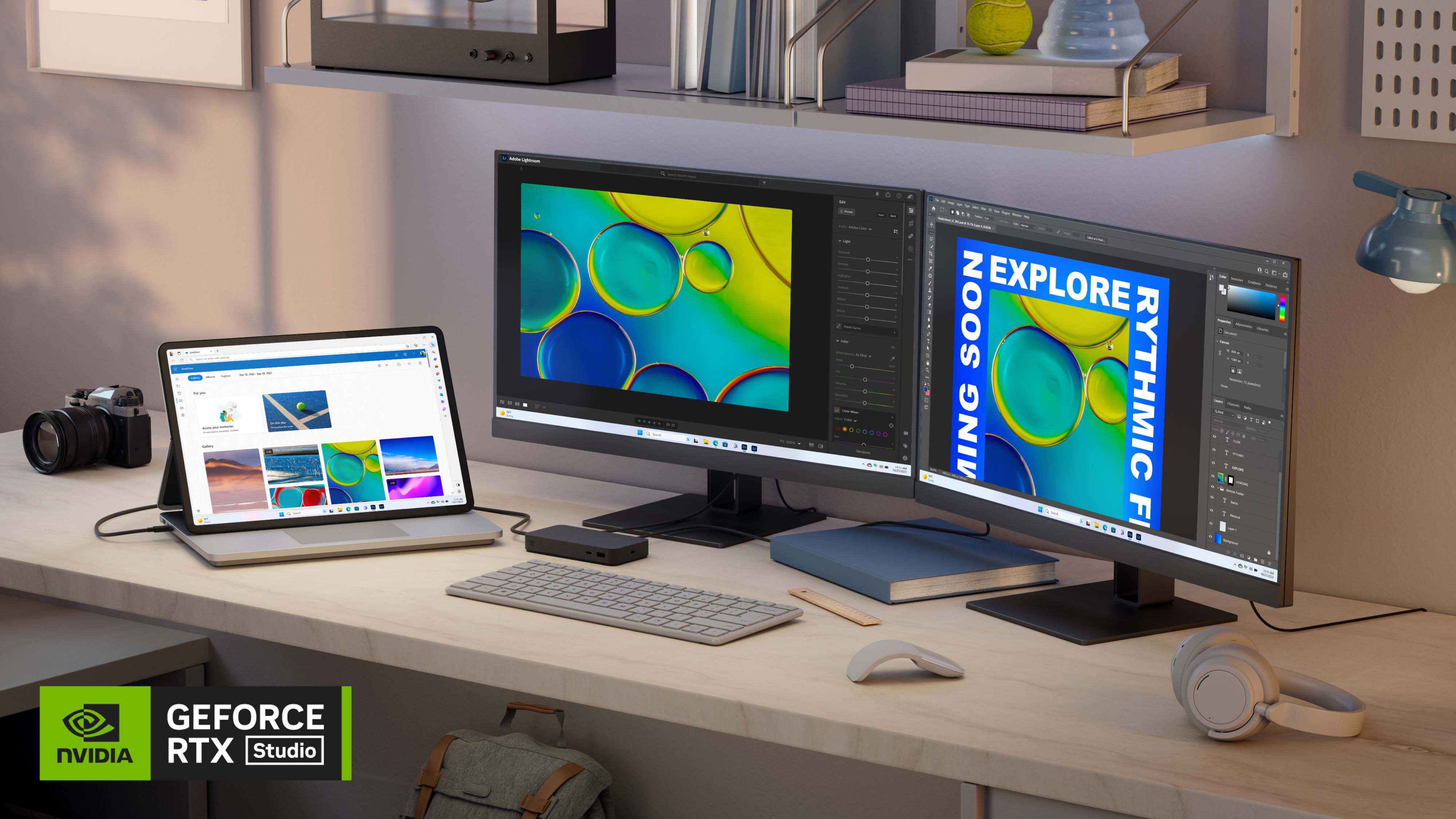 Surface Laptop Studio 2 on a wooden desk powering two external monitors alongside an external keyboard, mouse and headphones.