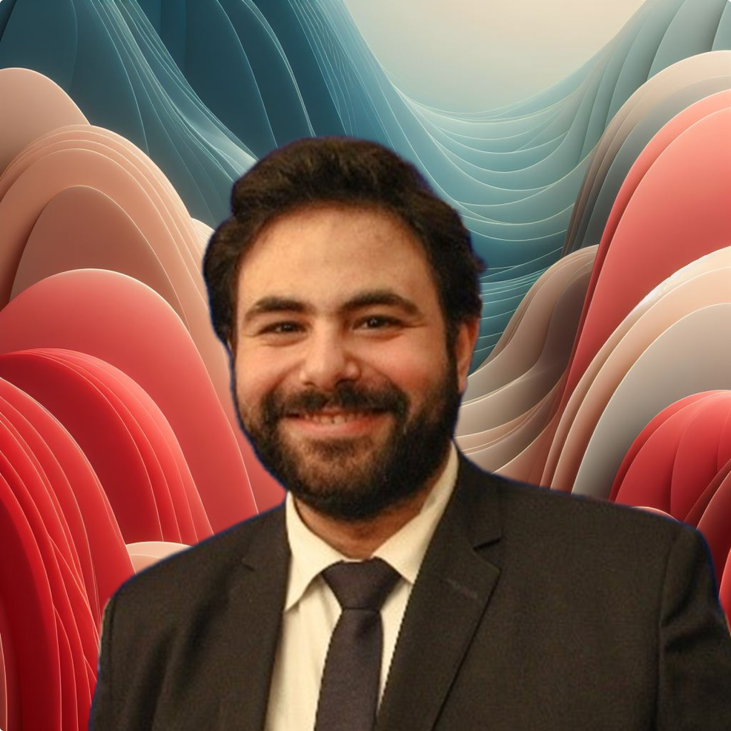 A man in a suit smiling against a colorful wavy background in shades of red and blue.