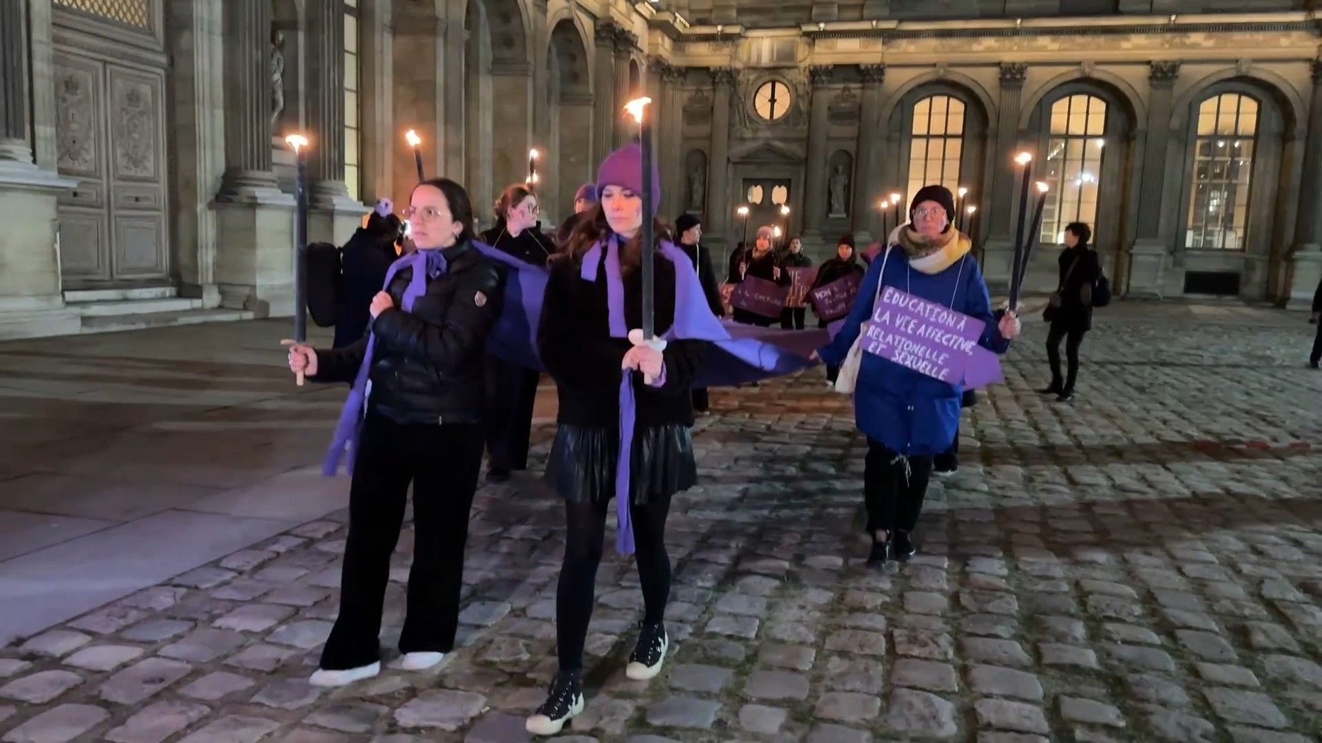 Women's right group protest outside Le Louvre in Paris