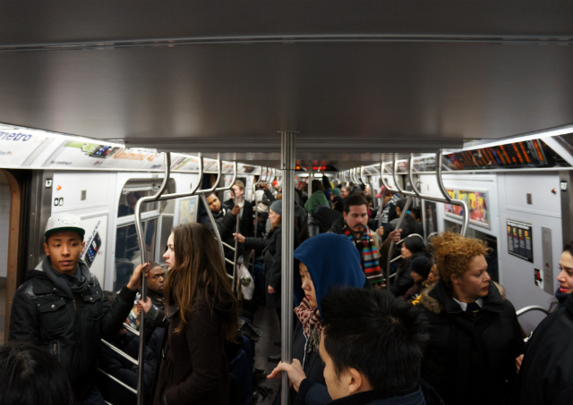 Crowds on an uptown F train on a Sunday afternoon. It could be much worse. Image by Pacific Coast Highway.