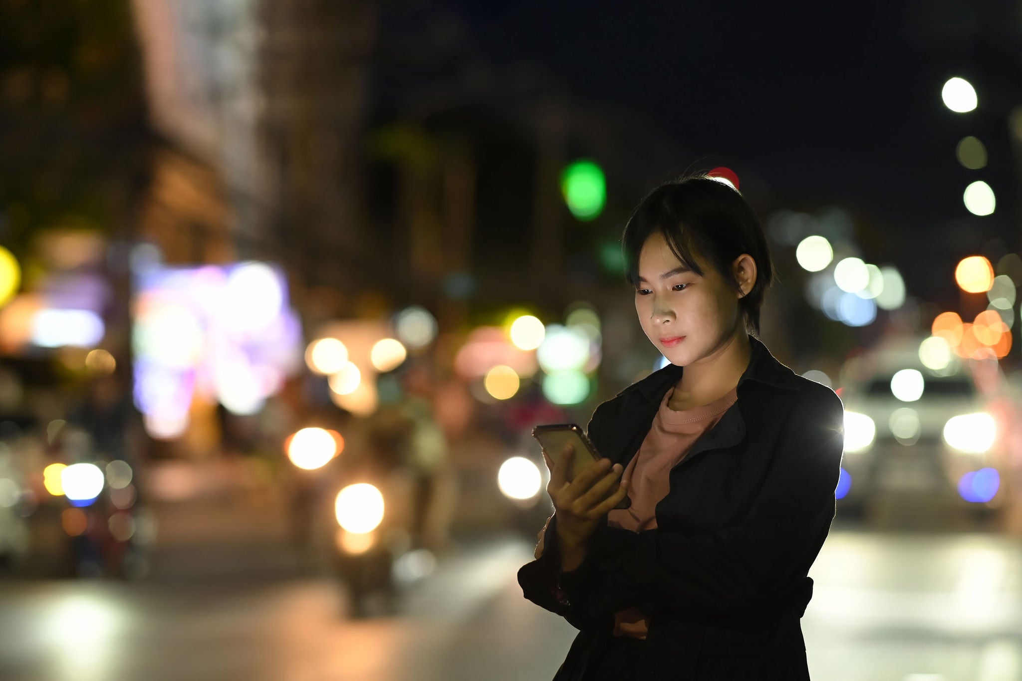 Woman looking on a mobile phone