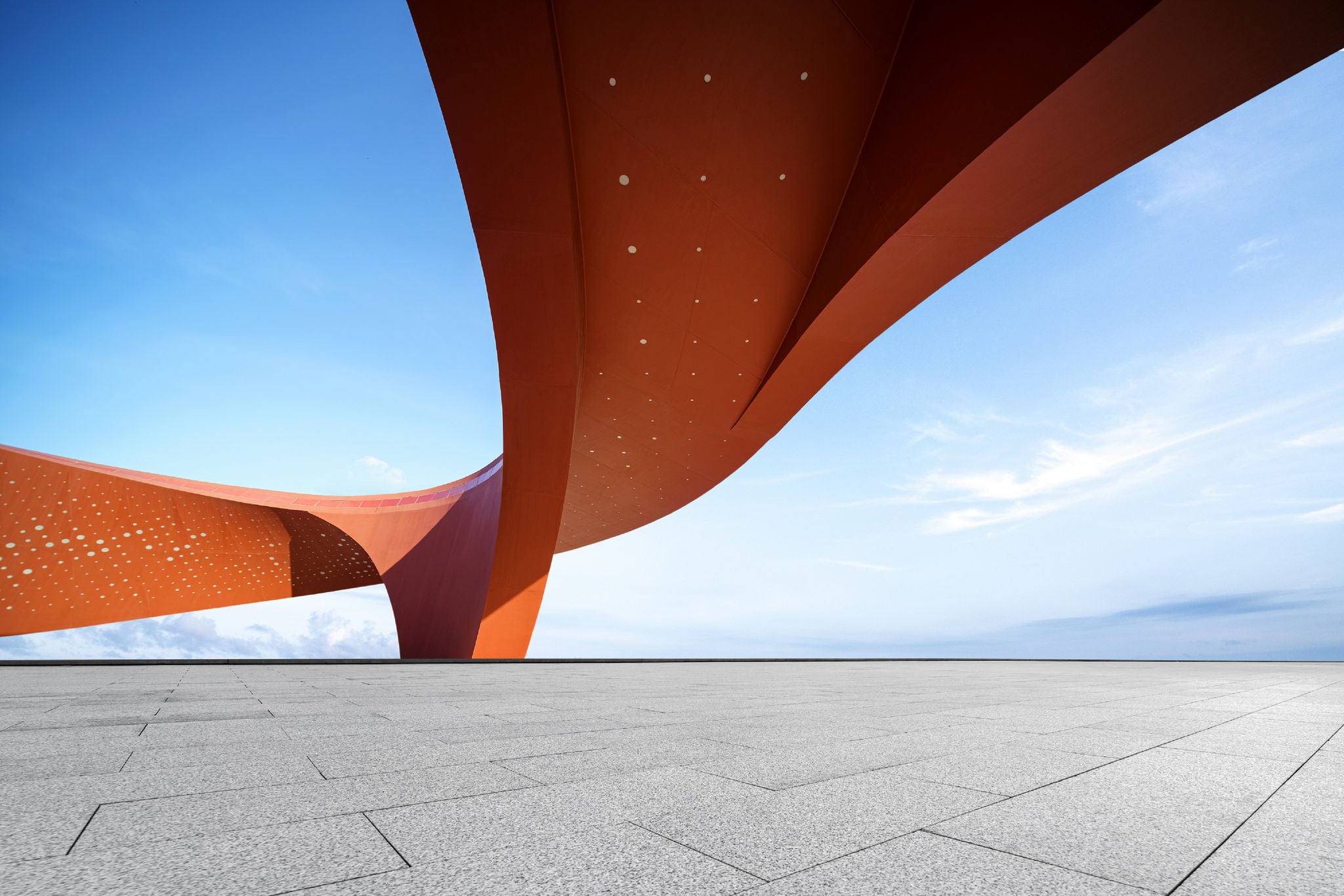 Red abstract buildings and open spaces, 3D rendering of buildings and ground and sky materials synthesis