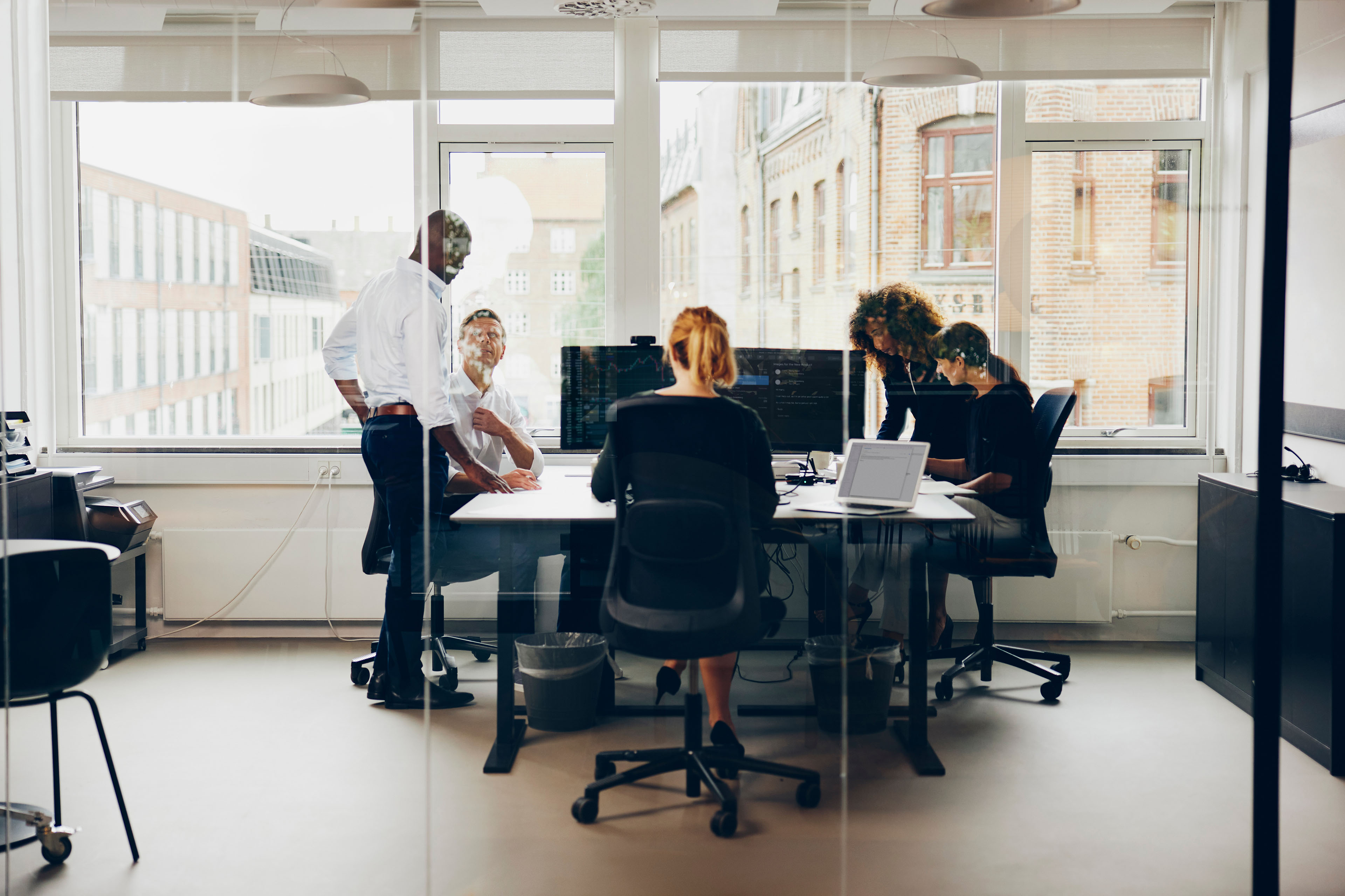 Business people working inside a modern office