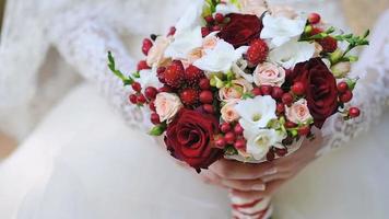 A Bride Holding A Wedding Bouquet video