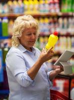 Mature woman shopping photo