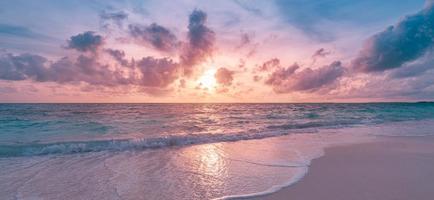 Closeup sea sand beach. Panoramic beach landscape. Inspire tropi photo