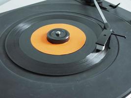 Vinyl record on turntable photo