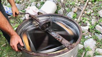 close up view bee honey extraction machine in action. Natural process of honey making video