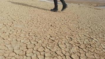 Young pretty caucasian woman walks on mud volcanoes. Travel destination in Georgia - Chachuna managed reserve video