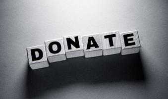 Donate Word with Wooden Cubes photo