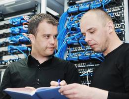 it engineer in network server room photo