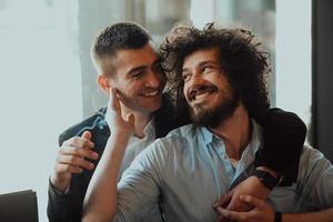 Diverse friends gay couple hugging. Stylish cool generation z men dating in love enjoy romantic relationships photo