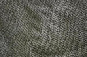 The texture of a very old brown sack cloth. Retro texture with canvas material. Background image with copy space photo