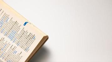 Close up of a book on a white background with space for text photo