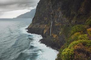 Drone view of Cascata do Corrego da Furna in Madeira, Portugal photo