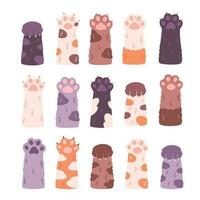 Cute cat's paws collection. Different funny pet paws with claws, animals hands vector