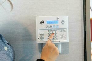 Office of home security alarm concept. Home security alarm keypad photo