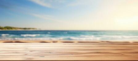 Wooden table top on blurred beach background photo