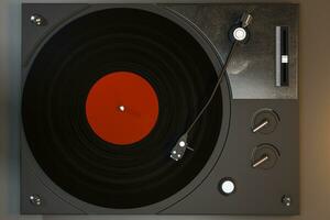 The dark vinyl record player on the table, 3d rendering. photo