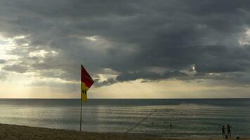 Rain storm over the ocean. Timelapse gray rain clouds on the seashore. Rain clouds gather over the sea video