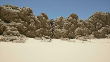 A group of rocks sitting in the middle of a desert video