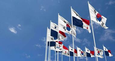 Panama and South Korea Flags Waving Together in the Sky, Seamless Loop in Wind, Space on Left Side for Design or Information, 3D Rendering video