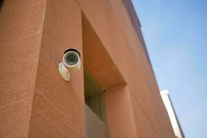 CCTV security camera operating outdoor photo