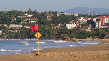 Puerto Escondido Oaxaca Mexico 2022 Red flag swimming prohibited high waves in Puerto Escondido Mexico. video