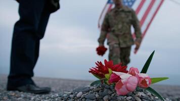 Soldier Paying Tribute To A Tomb At The Beach video