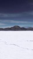 Bonneville Salt Flats landscape with rain storm clouds in distance video